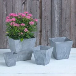 Novelty Artstone 11.5 In. H X 11.8 In. W X 11.8 In. D Resin Ella Planter Gray -ORBIT || ACE || TORO Shop cce86487 b930 4f0d 90a3 b848d22b7b5e